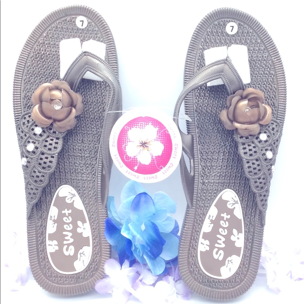 Sweet rhinestone flip flops. New size 7